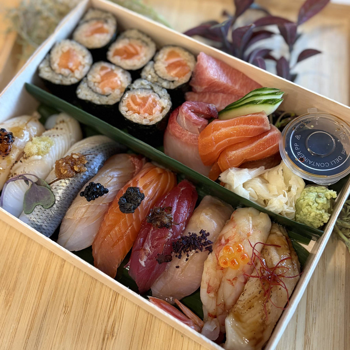 Chef's Selection with Maki & Sashimi in a wooden box